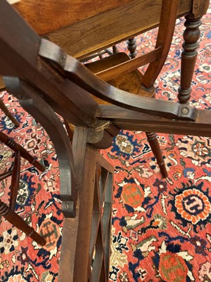 Lot 66 - A set of four George III-style mahogany 'cockpen' elbow chairs