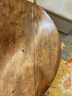 Lot 56 - A George III elm cricket table