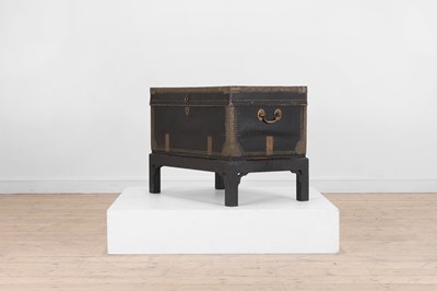 Lot 48 - An export leather and brass chest on stand