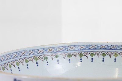 Lot 2 - A delftware tin-glazed earthenware punchbowl