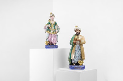 Lot 54 - A pair of porcelain figural scent holders