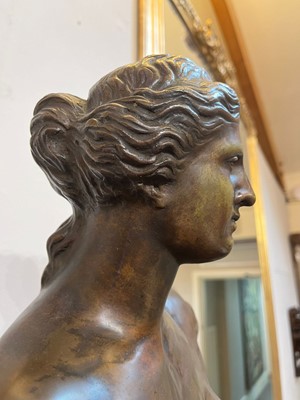 Lot 158 - A patinated bronze figure after the antique