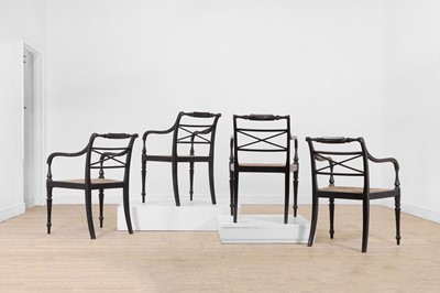 Lot 55 - A set of four Regency-style elbow chairs
