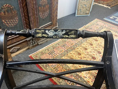 Lot 55 - A set of four Regency-style elbow chairs