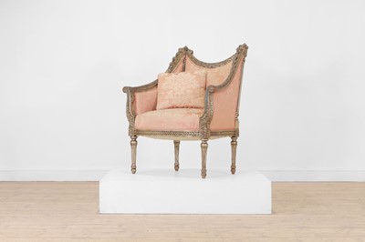 Lot 254 - A Louis XV-style carved, silvered and parcel-gilt bergère