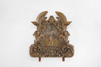Lot 71 - A carved and painted altarpiece