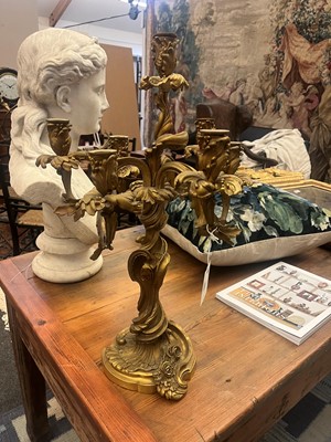 Lot 38 - A pair of Louis XV-style ormolu candelabra