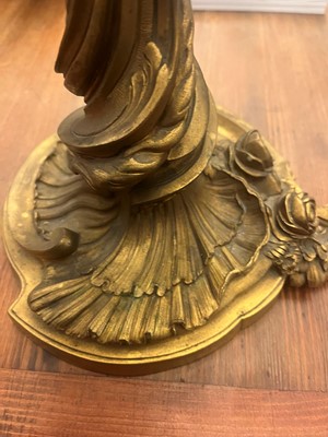 Lot 38 - A pair of Louis XV-style ormolu candelabra