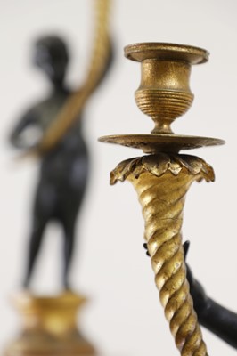 Lot 144 - A pair of Louis XVI-style figural candelabra