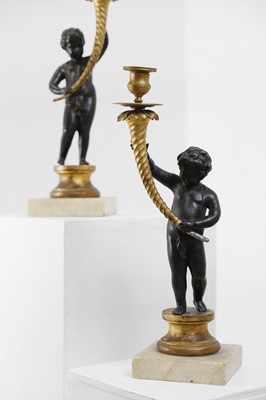 Lot 144 - A pair of Louis XVI-style figural candelabra