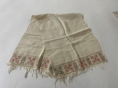 Lot 176 - A group of embroidered towels and fragments