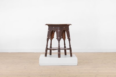 Lot 356 - A carved walnut and mother-of-pearl occasional table