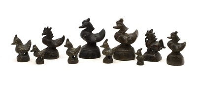 Lot 72 - A group of ten bronze opium weights