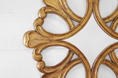 Lot 46 - A large Hollywood Regency giltwood mirror