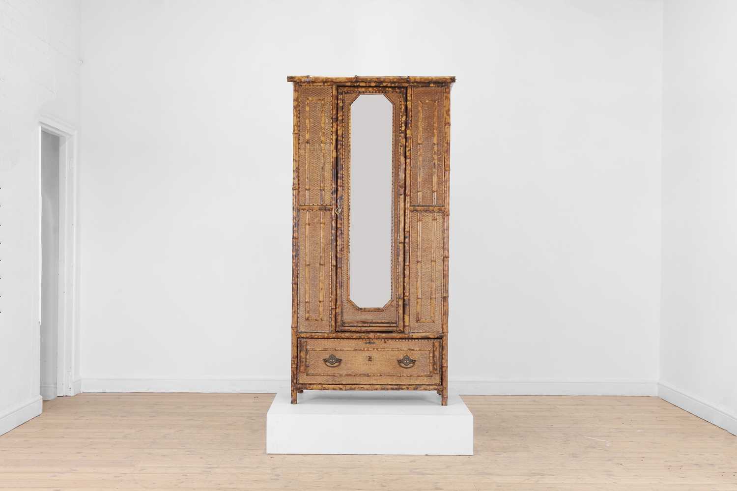 Lot 187 - A Japonesque bamboo wardrobe