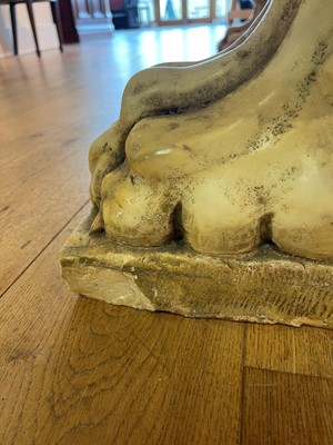 Lot 53 - A marble and travertine console table after the antique