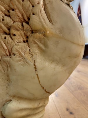 Lot 53 - A marble and travertine console table after the antique