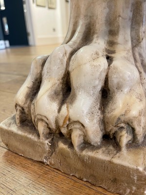 Lot 53 - A marble and travertine console table after the antique