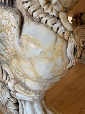 Lot 53 - A marble and travertine console table after the antique