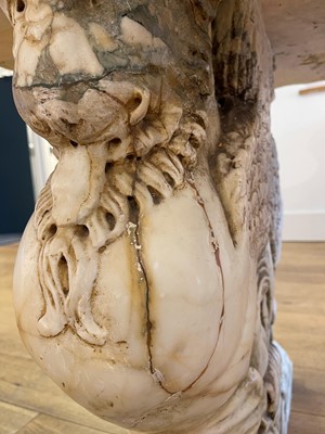 Lot 53 - A marble and travertine console table after the antique