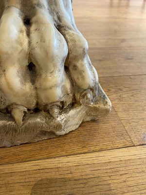 Lot 53 - A marble and travertine console table after the antique