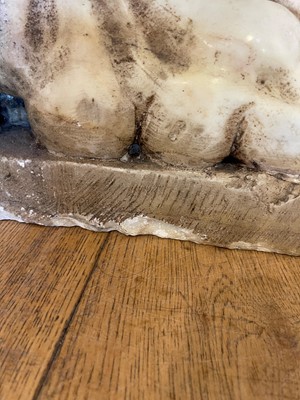 Lot 53 - A marble and travertine console table after the antique