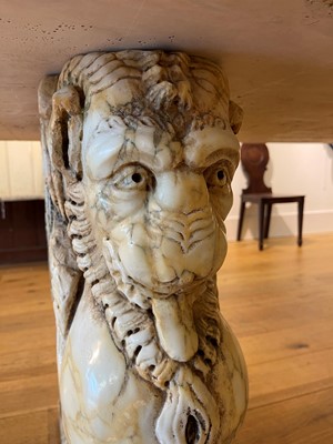 Lot 53 - A marble and travertine console table after the antique