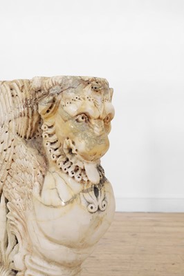 Lot 53 - A marble and travertine console table after the antique