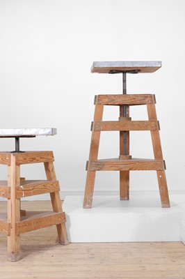 Lot 80 - A set of three pine and metal pottery stands