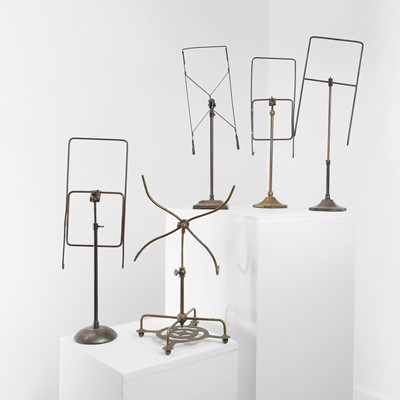Lot 275 - Five brass and copper display stands