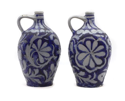 Lot 115 - A pair of Westerwald style German salt glazed jugs