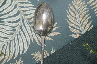 Lot 231 - A Queen Anne silver basting spoon