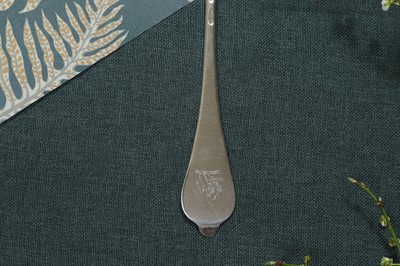 Lot 231 - A Queen Anne silver basting spoon