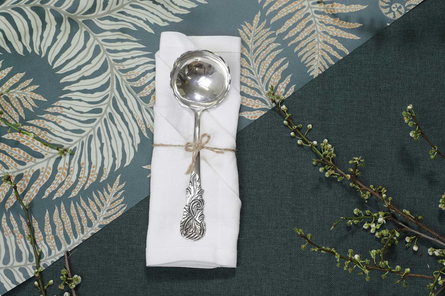 Lot 232 - A small George II silver naturalistic ladle