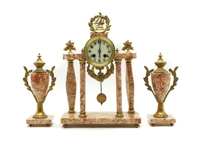 Lot 169 - An Empire style hardstone clock