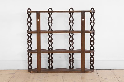 Lot 197 - A set of painted wall-hanging shelves