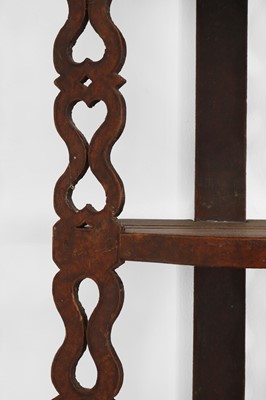 Lot 197 - A set of painted wall-hanging shelves