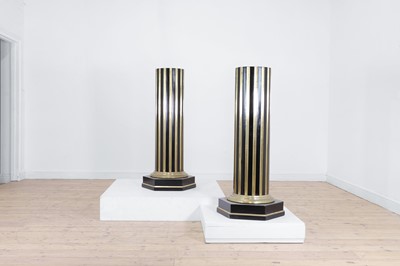 Lot 161 - A pair of ebonised and parcel-gilt wooden columns