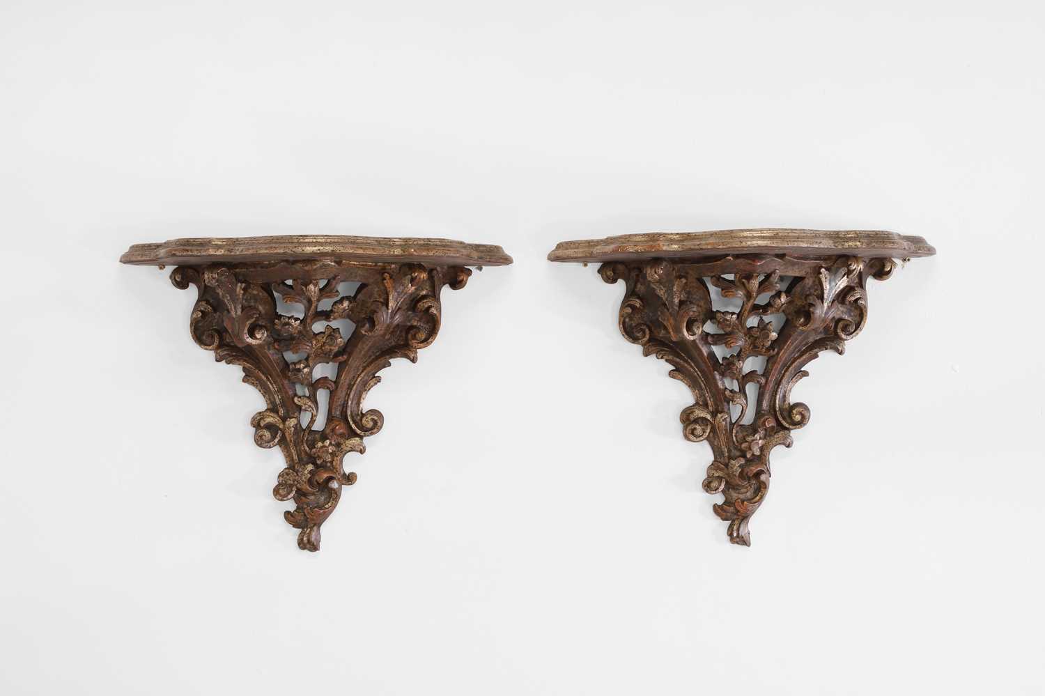 Lot 119 - A pair of silvered wooden wall brackets