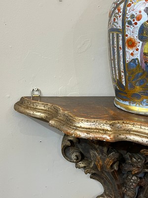 Lot 119 - A pair of silvered wooden wall brackets