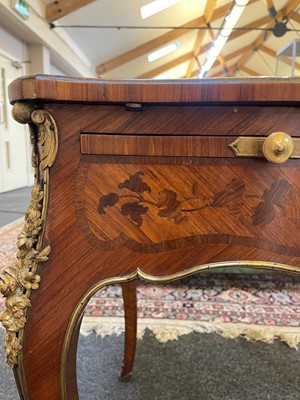 Lot 27 - A Louis XV-style kingwood and tulipwood marquetry bureau plat