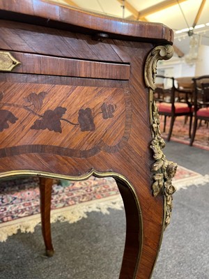 Lot 27 - A Louis XV-style kingwood and tulipwood marquetry bureau plat
