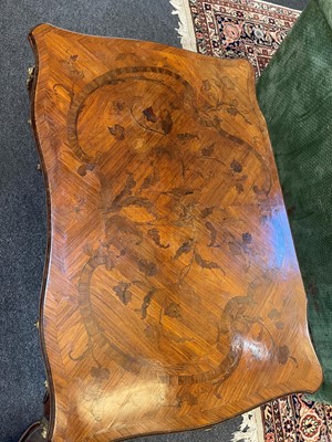 Lot 27 - A Louis XV-style kingwood and tulipwood marquetry bureau plat