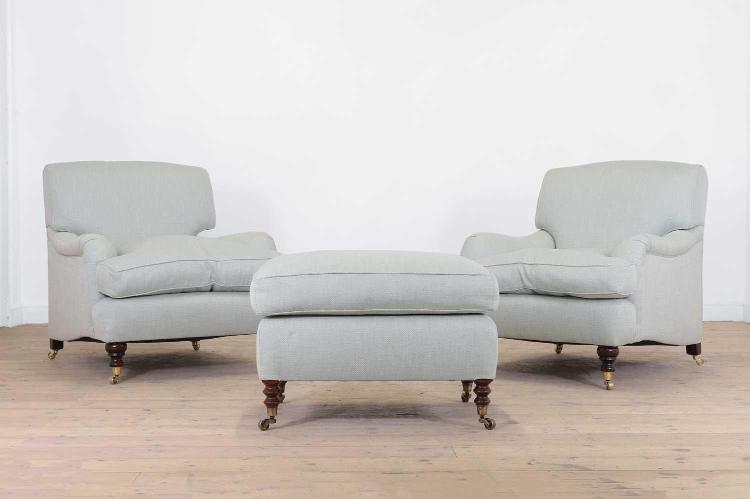Lot 41 - A pair of upholstered armchairs by George Smith