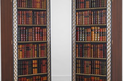 Lot 18 - A pair of painted and parcel-gilt wooden cupboards