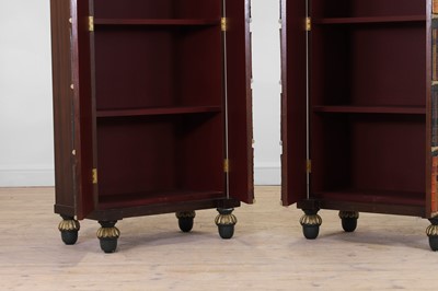 Lot 18 - A pair of painted and parcel-gilt wooden cupboards