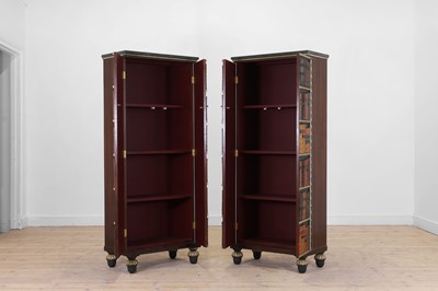 Lot 18 - A pair of painted and parcel-gilt wooden cupboards