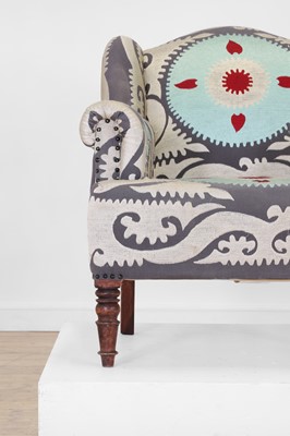 Lot 49 - A Victorian-style wingback armchair