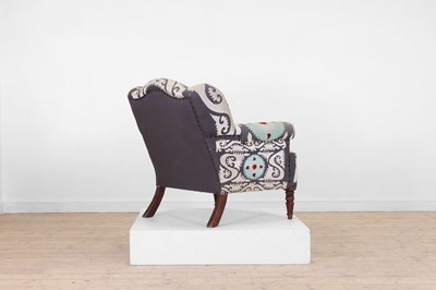 Lot 49 - A Victorian-style wingback armchair