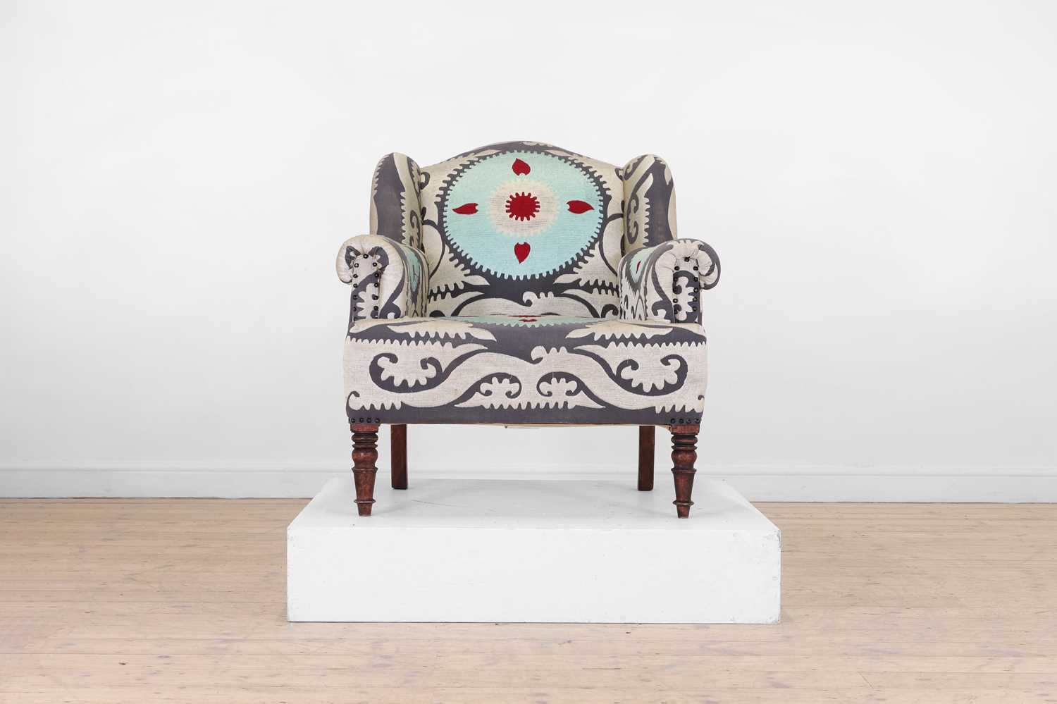 Lot 49 - A Victorian-style wingback armchair